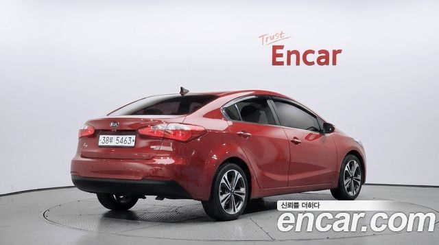 Kia K3 2013 — photo 2