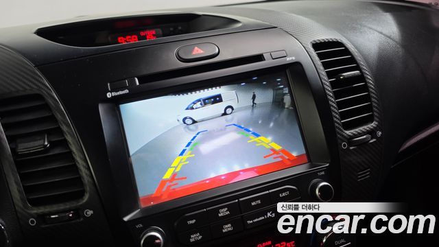 Kia K3 2013 — photo 14