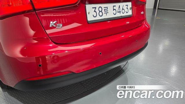 Kia K3 2013 — photo 16
