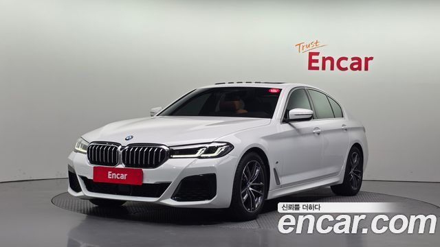 BMW 5-Series 2023 — photo 1