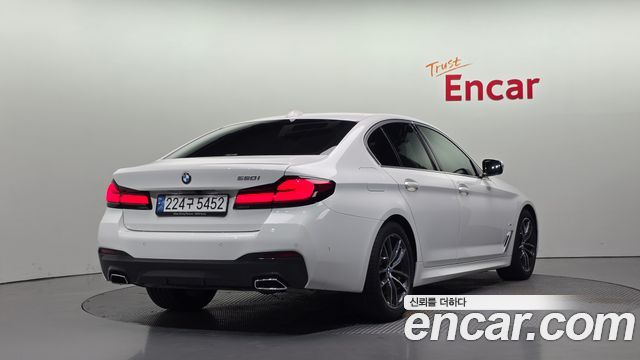 BMW 5-Series 2023 — photo 2