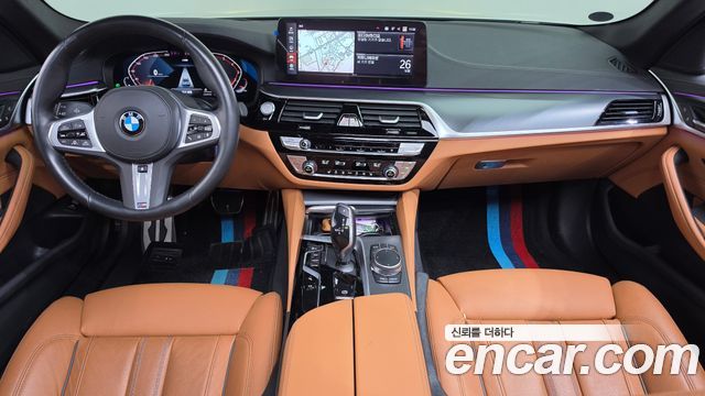 BMW 5-Series 2023 — photo 10