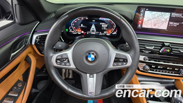 BMW 5-Series 2023 — photo 19