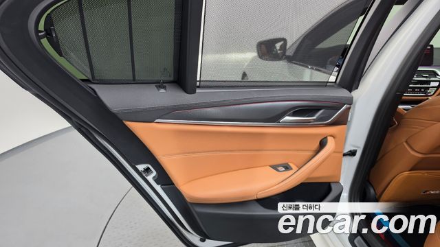 BMW 5-Series 2023 — photo 15