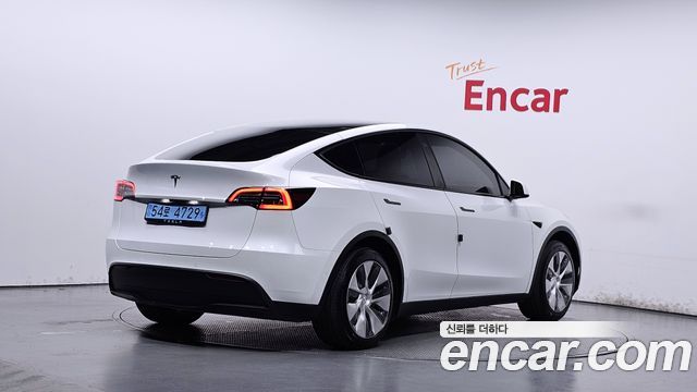 Tesla Model Y 2021 — photo 2