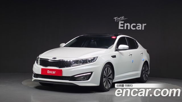 Kia K5 2011 — photo 1
