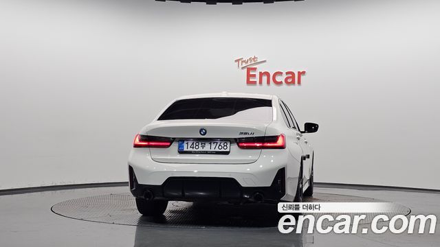 BMW 3-Series 2023 — photo 4
