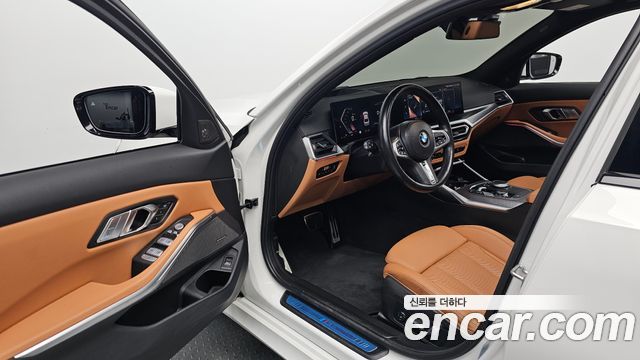 BMW 3-Series 2023 — photo 13