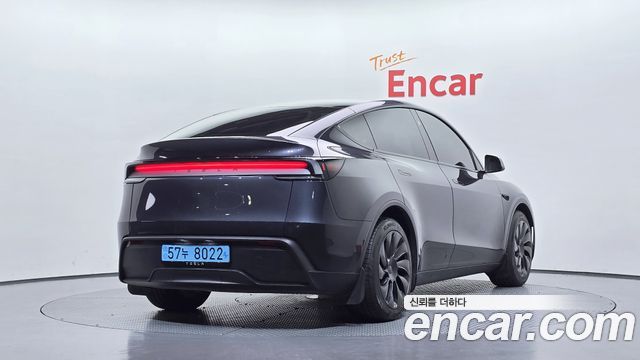 Tesla Model Y 2025 — photo 2