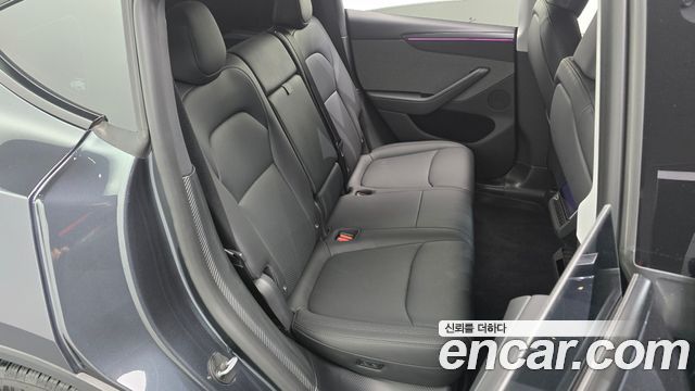 Tesla Model Y 2025 — photo 11