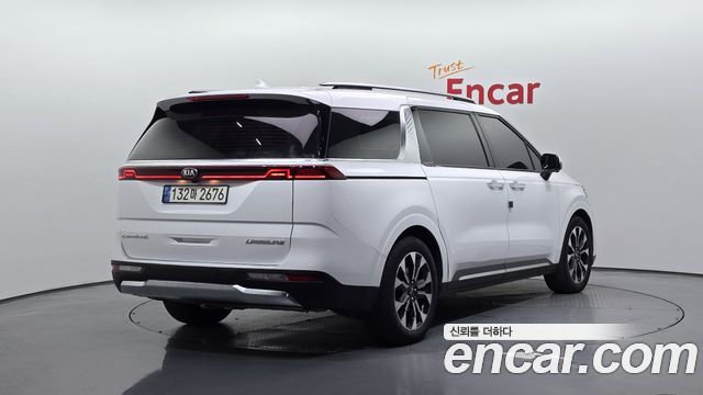 Kia Canival 2021 — photo 2