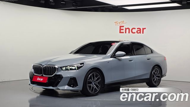 BMW 5-Series 2024 — photo 1