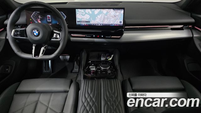 BMW 5-Series 2024 — photo 10