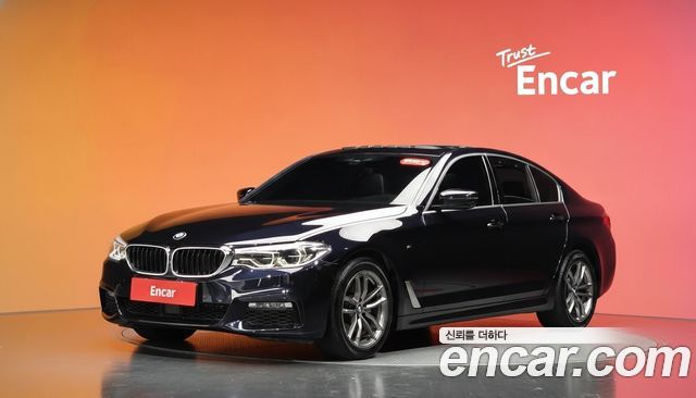 BMW 5-Series 2018 — photo 1
