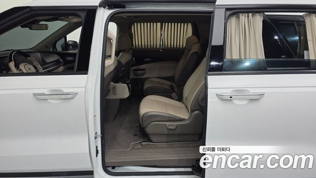 Kia Canival 2021 — photo 16