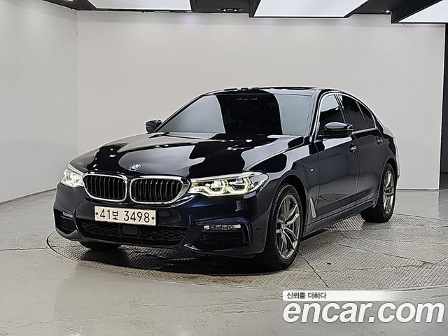 BMW 5-Series 2018 — photo 1
