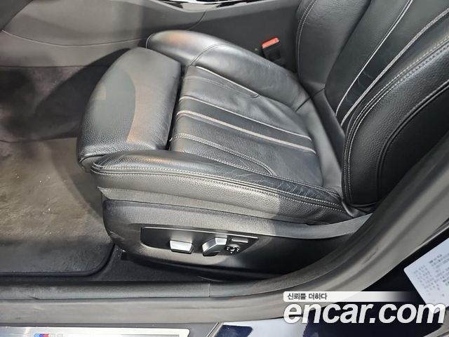 BMW 5-Series 2018 — photo 18