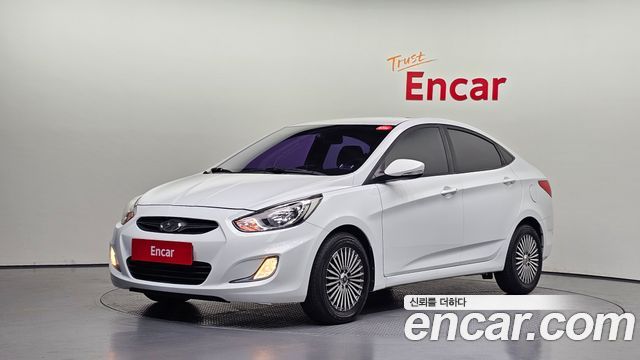 Hyundai Accent 2012 — photo 1