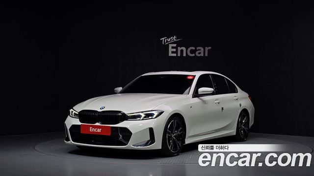 BMW 3-Series 2023 — photo 1