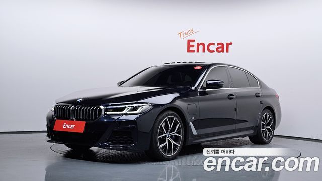 BMW 5-Series 2021 — photo 1
