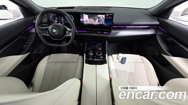 BMW 5-Series 2024 — photo 10