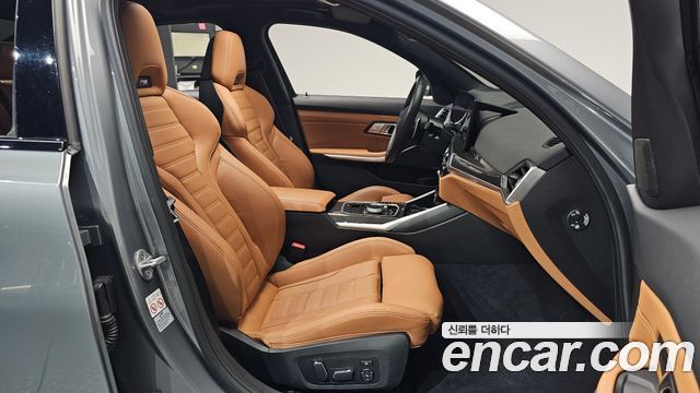 BMW 3-Series 2024 — photo 18