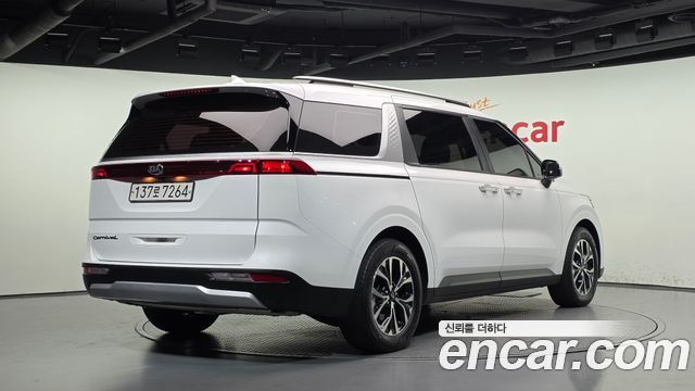 Kia Canival 2021 — photo 2