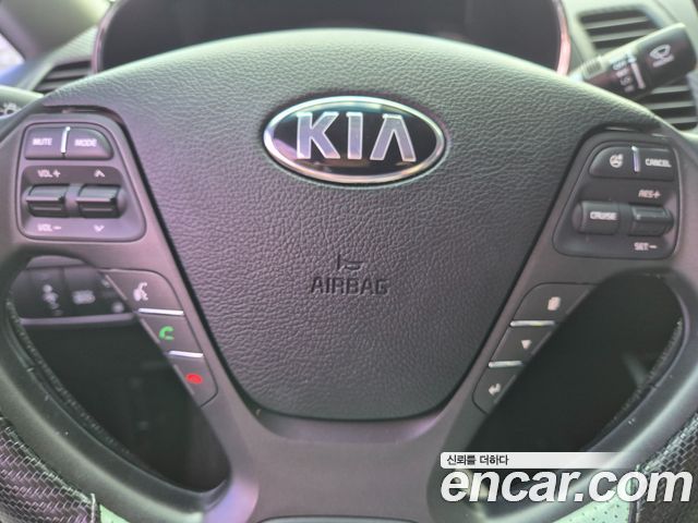 Kia K3 2014 — photo 15