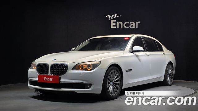 BMW 7-Series 2010 — photo 1