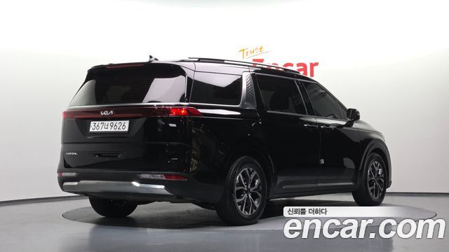 Kia Canival 2023 — photo 2