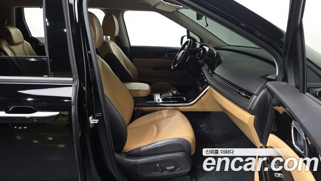 Kia Canival 2023 — photo 16