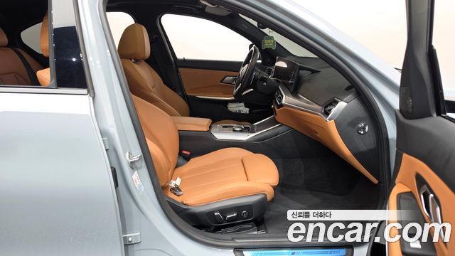 BMW 3-Series 2024 — photo 16