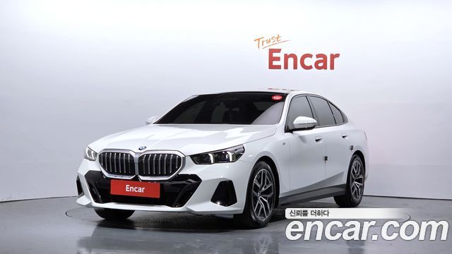 BMW 5-Series 2024 — photo 1