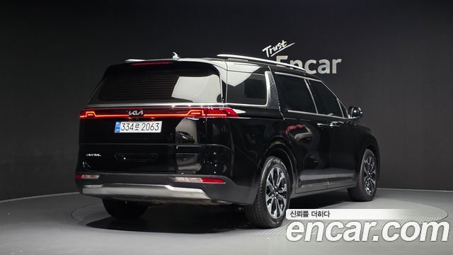Kia Canival 2023 — photo 2