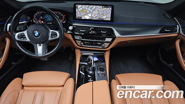 BMW 5-Series 2023 — photo 10