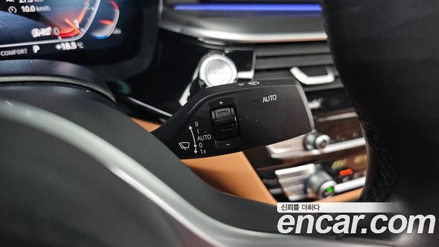 BMW 5-Series 2023 — photo 22