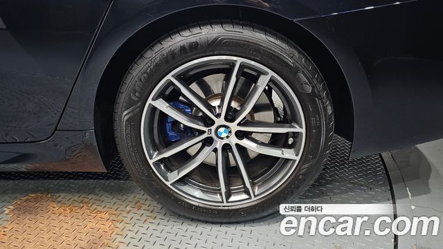 BMW 5-Series 2023 — photo 7
