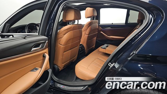 BMW 5-Series 2023 — photo 16