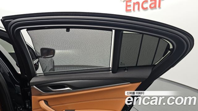 BMW 5-Series 2023 — photo 31