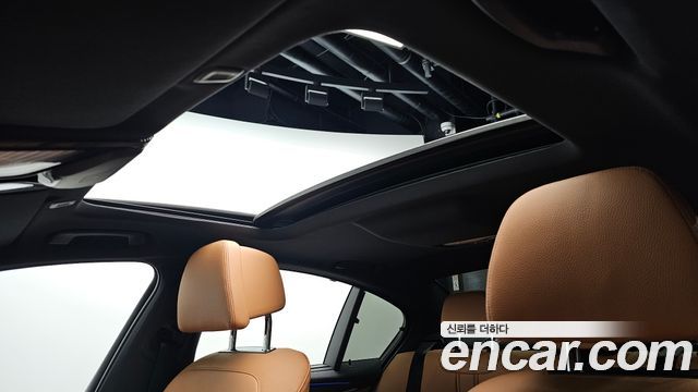 BMW 5-Series 2023 — photo 34