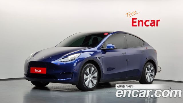Tesla Model Y 2023 — photo 1