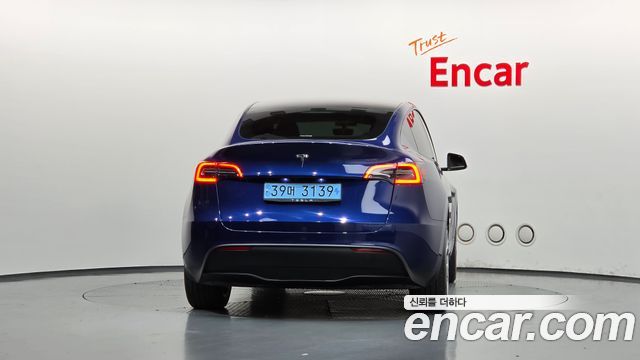 Tesla Model Y 2023 — photo 4