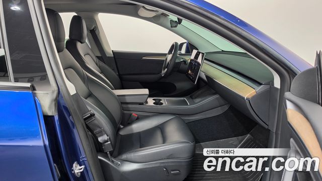 Tesla Model Y 2023 — photo 16