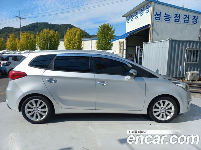 Kia Carens 2014 — photo 8