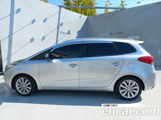 Kia Carens 2014 — photo 12