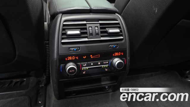 BMW 7-Series 2009 — photo 18