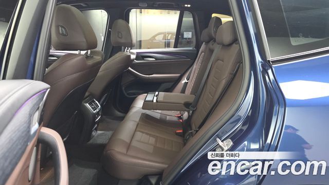 BMW iX3 2024 — photo 18