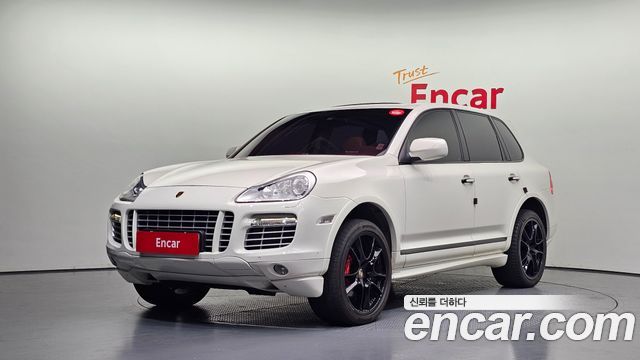 Porsche Cayenne 2010 — photo 1