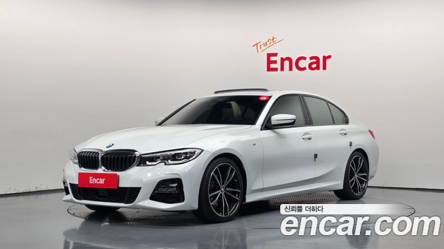 BMW 3-Series 2022 — photo 1