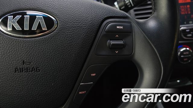 Kia K3 2014 — photo 26